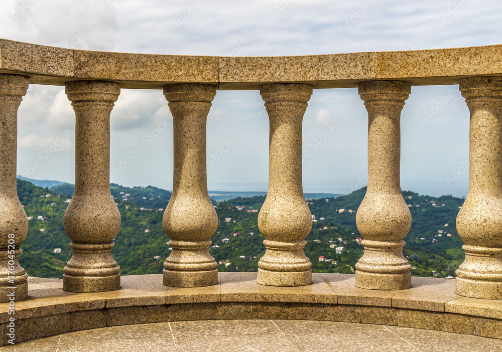 Fototapeta premium Terrace with concrete architectural balusters on a high mountain.