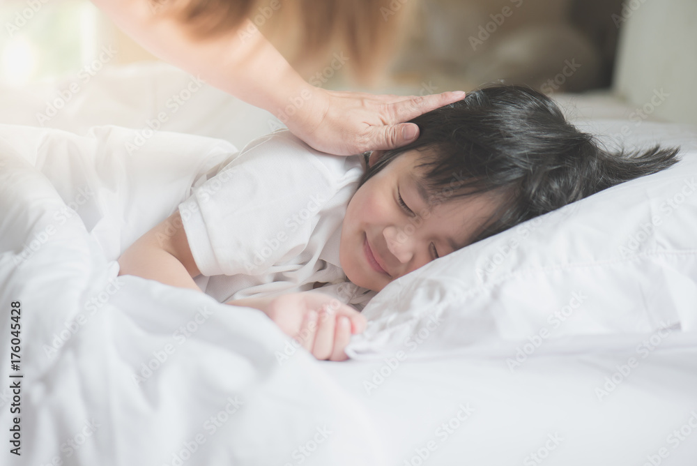 Asian child sleeping on white bed Asian child sleeping on white bed