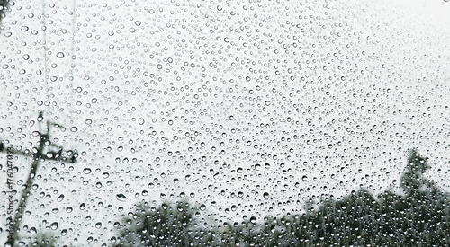 Rain drops on car window background