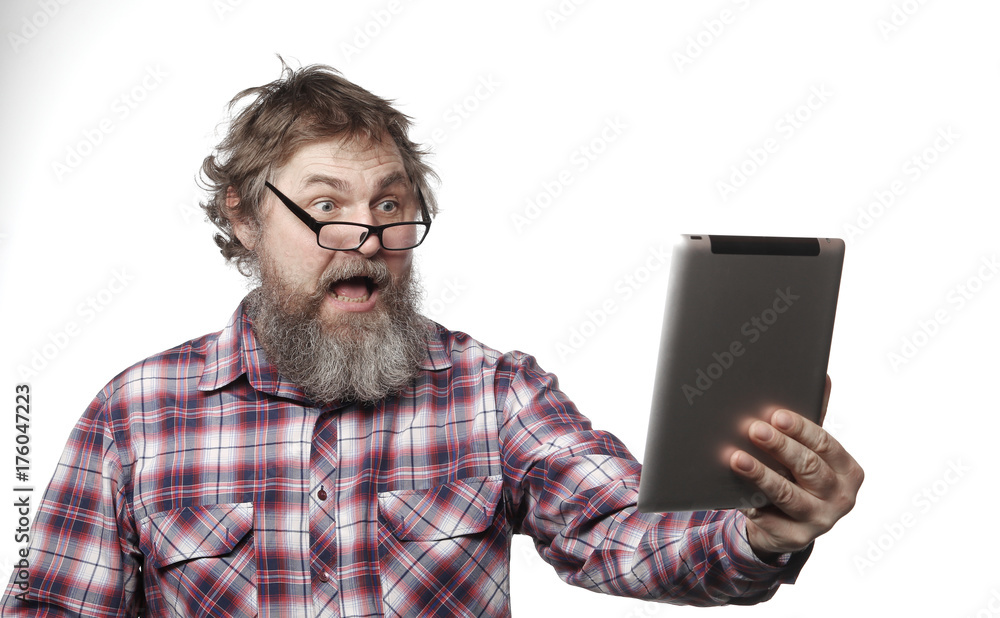 Portrait of an adult man with a beard on a white background Portrait of an adult man with a beard on a white background