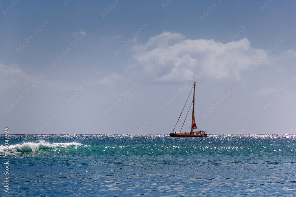 Fototapeta premium Sail Boat on a Tropical Sea