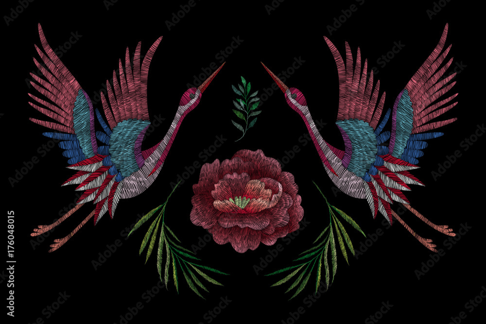 Obraz premium flowers cherry blossom and crane, east. traditional stylish fashionable embroidered embroidery on a black background. sketch for printing on fabric, bag, clothes, accessories and design. trend vector