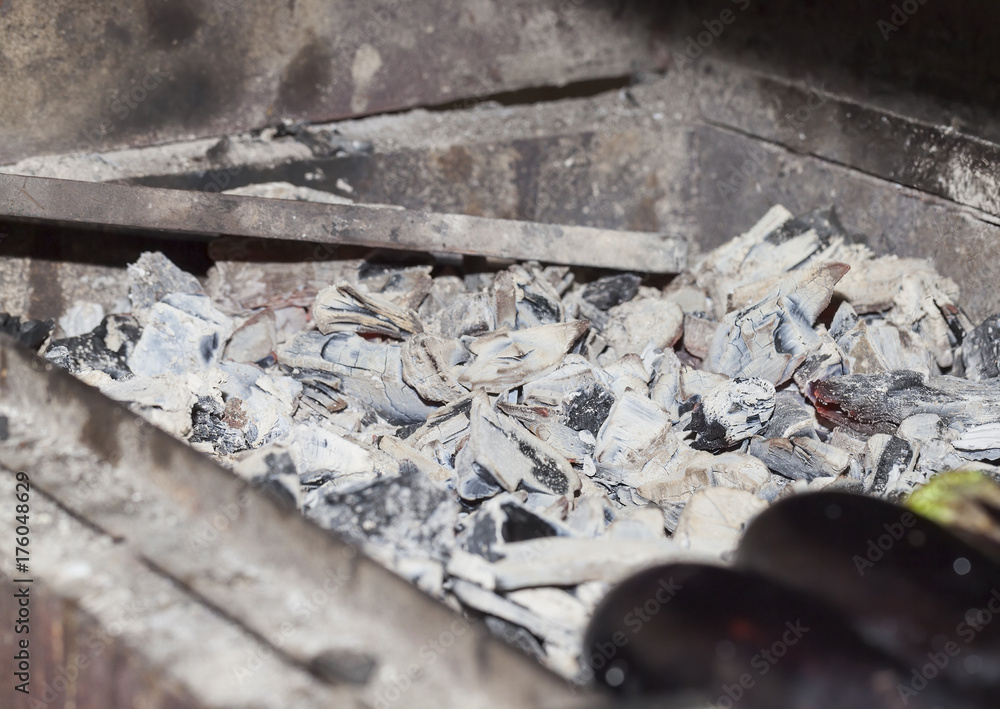 Fototapeta premium Coals in the grill, close-up