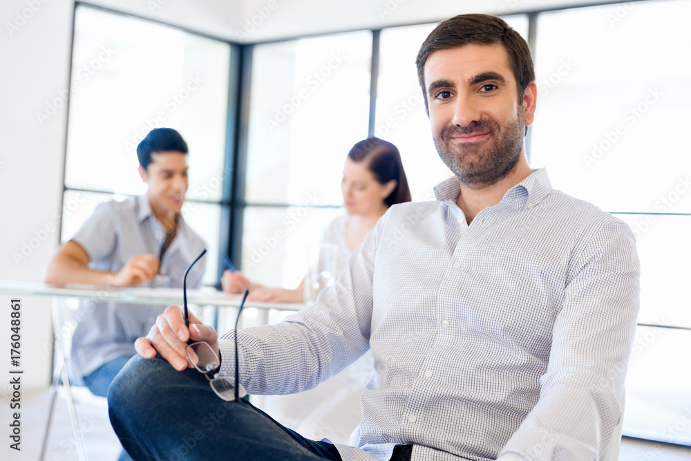Young man in casual in office