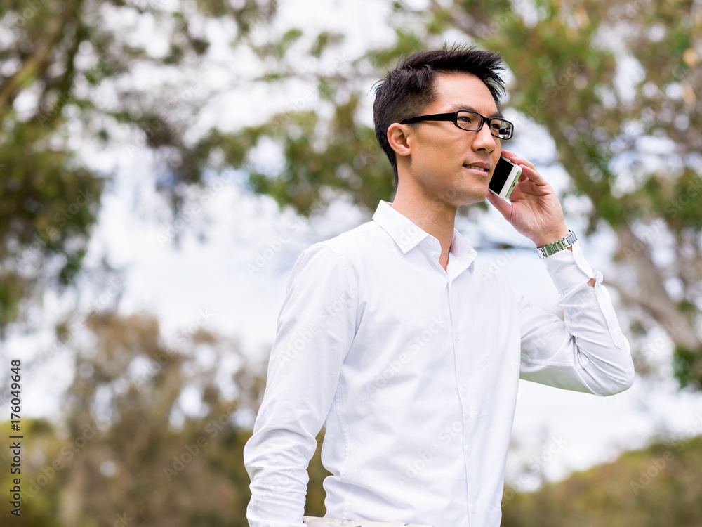 Businessman portrait with mobile phone outdoors Businessman portrait with mobile phone outdoors