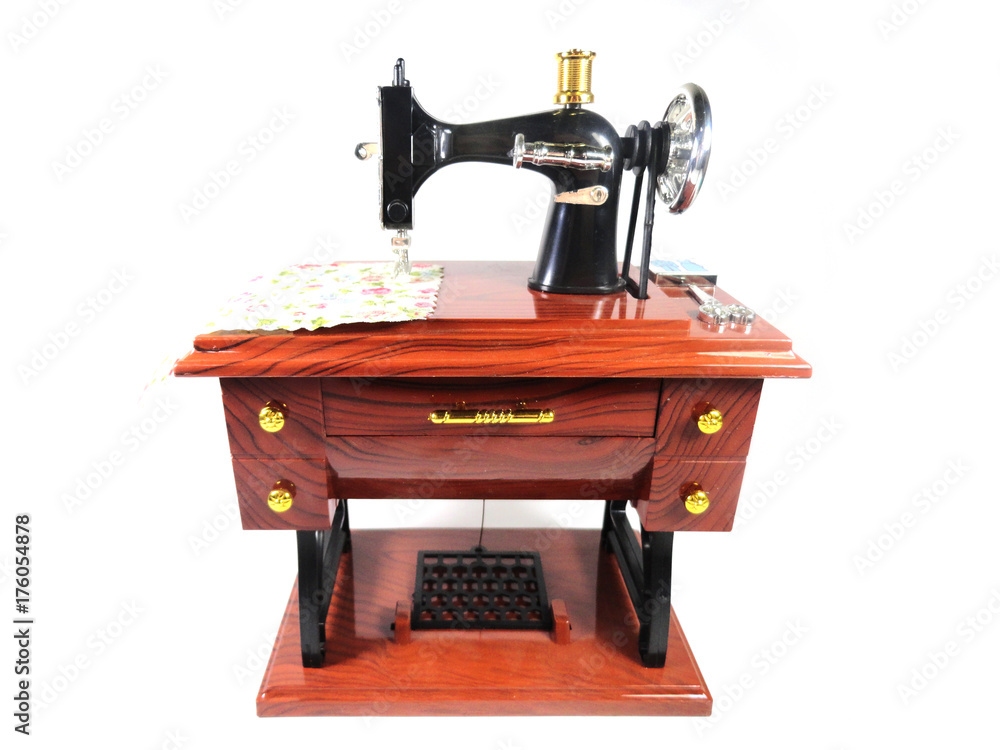 Sewing machine. Souvenir toy. Photo of a toy sewing machine.