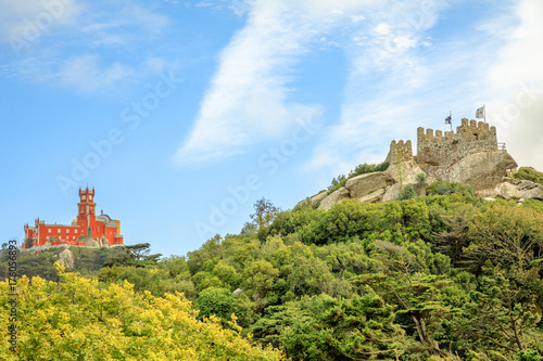 Sintra, Portugal. The original Pena Palace and the ruins of Moors Castle are two popular landmarks and major tourist attractions of the Cultural Landscape of Sintra as a World Heritage Site.