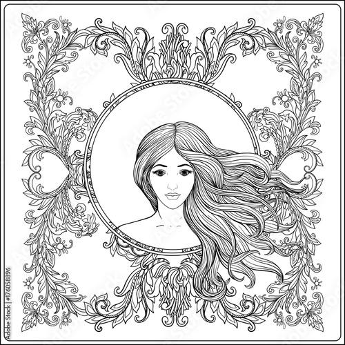 Young beautiful girl with long hair in rich decorated floral pat