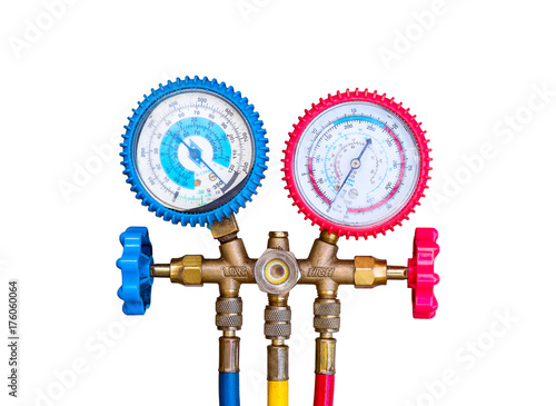 Air Conditioning Refrigerant, Pressure Gauges set isolate on white background. R134a R12 R22 AC Refrigeration charging A/C manifold dual gauge tester. Tools for Air Refill Kits. - Selective focus. photo