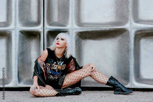 Portrait of stylish blonde grunge young woman 