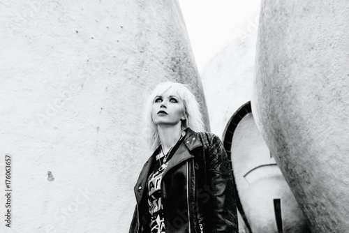 monochrome portrait of stylish blonde grunge young woman 