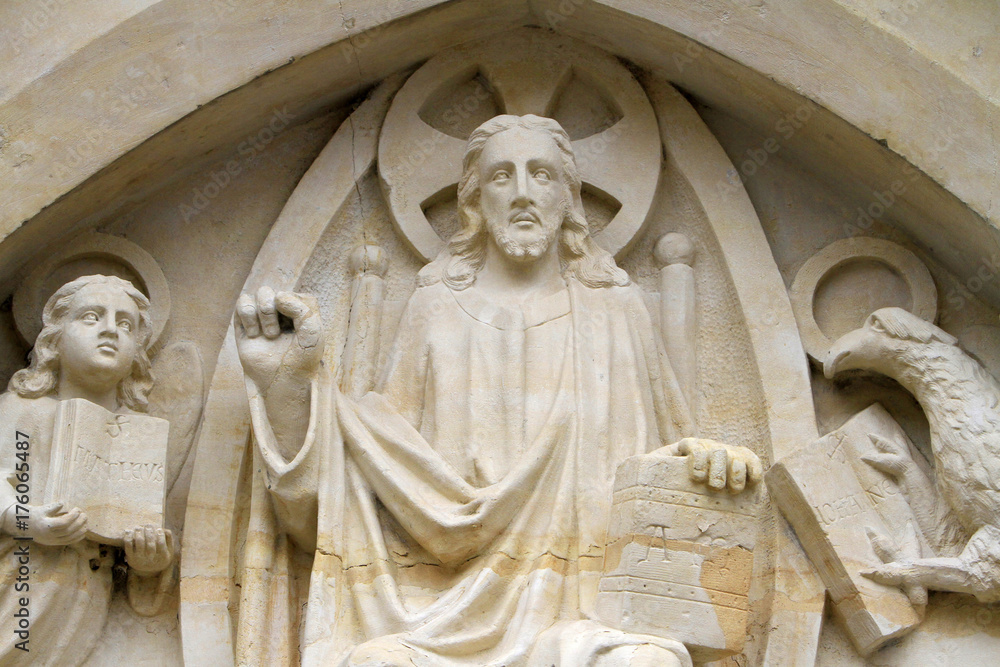 Tétramorphe. Jésus-Christ entouré des symboles de l'Apocalypse. Tympan. Couvent Saint-Gildard. Nevers. Tetramorph. Jesus Christ surrounded by the symbols of the Apocalypse. Tétramorphe. Jésus-Christ entouré des symboles de l'Apocalypse. Tympan. Couvent Saint-Gildard. Nevers. Tetramorph. Jesus Christ surrounded by the symbols of the Apocalypse.
