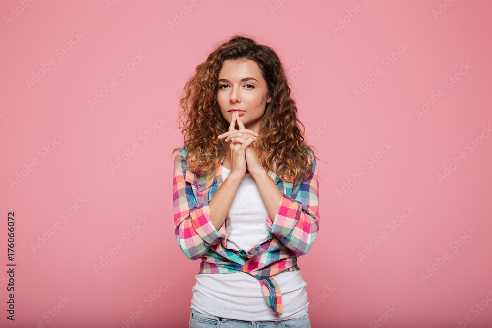 Thoughtful woman looking camera isolated Thoughtful woman looking camera isolated