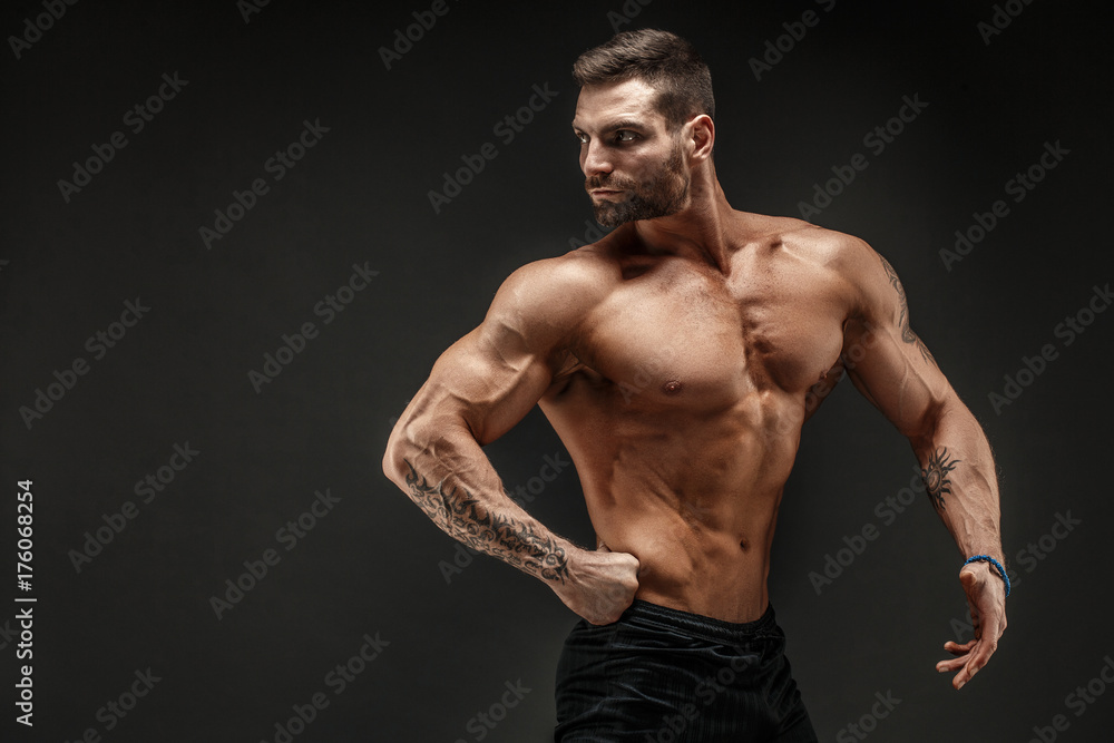 Very Brawny Guy Bodybuilder Posing. Beautiful Sporty Guy Male Power.  Fitness Muscled Man. Roar. Smoke Background. Stock Photo, Picture and  Royalty Free Image. Image 134712381.