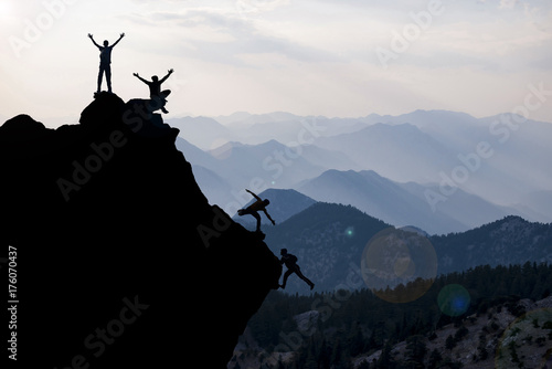 climbing helping team work , success concept © emerald_media