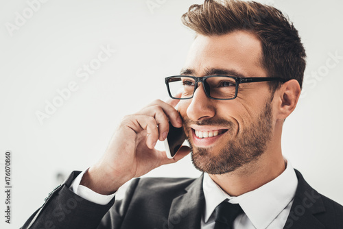 businessman talking by phone