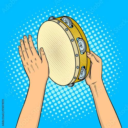 Hands with tambourine pop art vector illustration