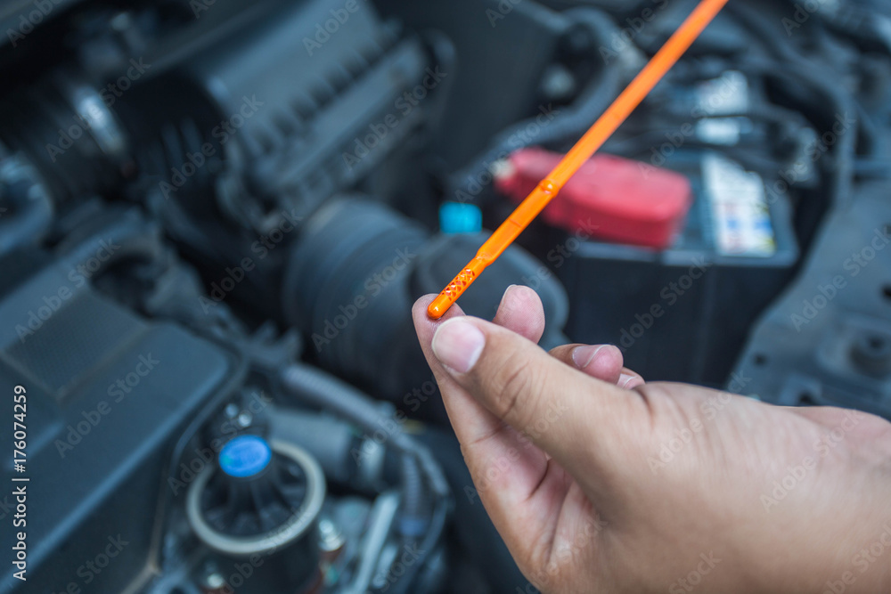 Car mechanic check oil level-01 Car mechanic check oil level-01