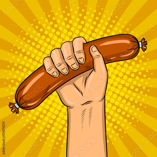 Sausage in hand pop art vector illustration