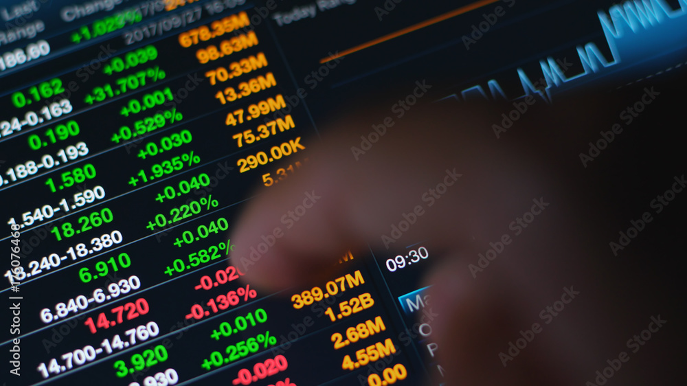 Fototapeta premium Watching stock market on tablet