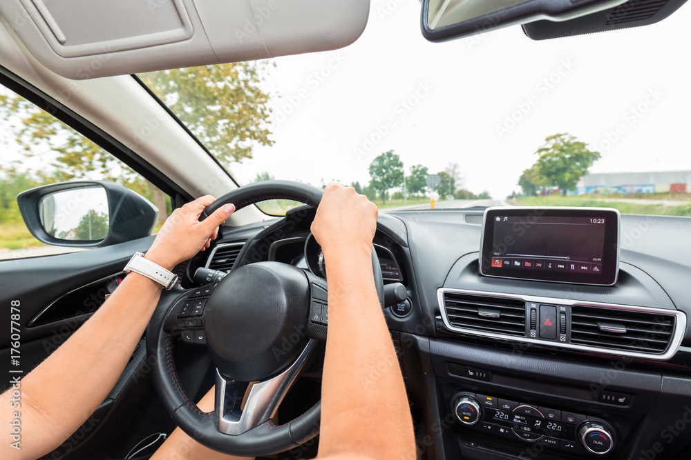 Driving a car on the road Driving a car on the road