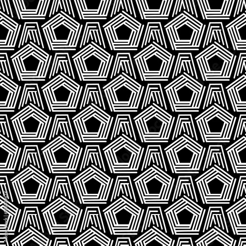 Geometric seamless pattern. Black and white abstract textured geometric seamless pattern. Symmetric monochrome textile backdrop. photo