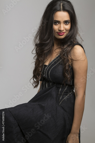 Beautiful portrait of cute Indian woman with gorgeous black hair
