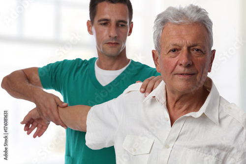 Chiropractic back adjustment, Osteopathy. Senior Male patient suffering from back pain and physical therapist