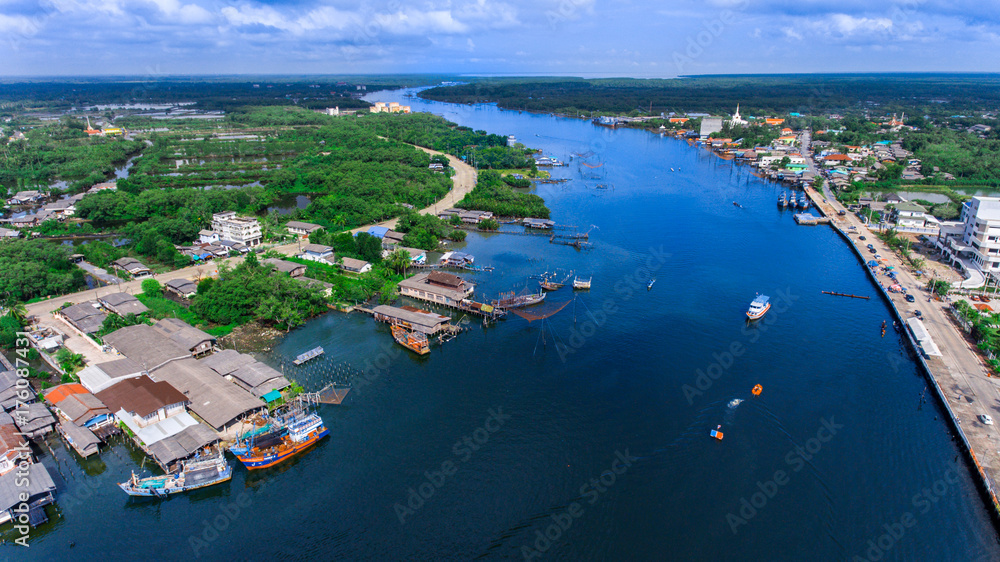 Aerial view of estuary, river and community