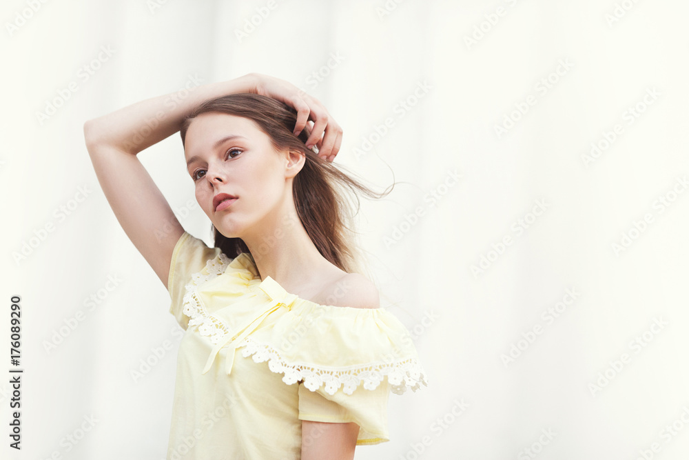 Beautiful young pretty girl on sunny city street Beautiful young pretty girl on sunny city street