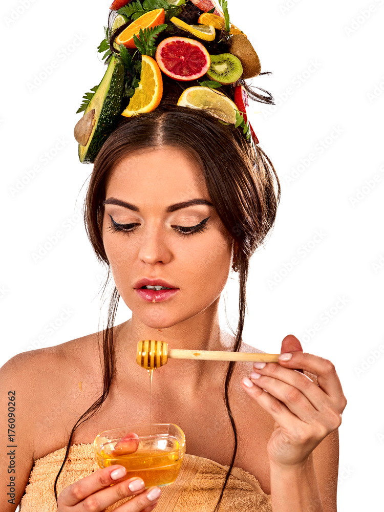 Honey facial mask with fresh fruits for hair and skin on woman head