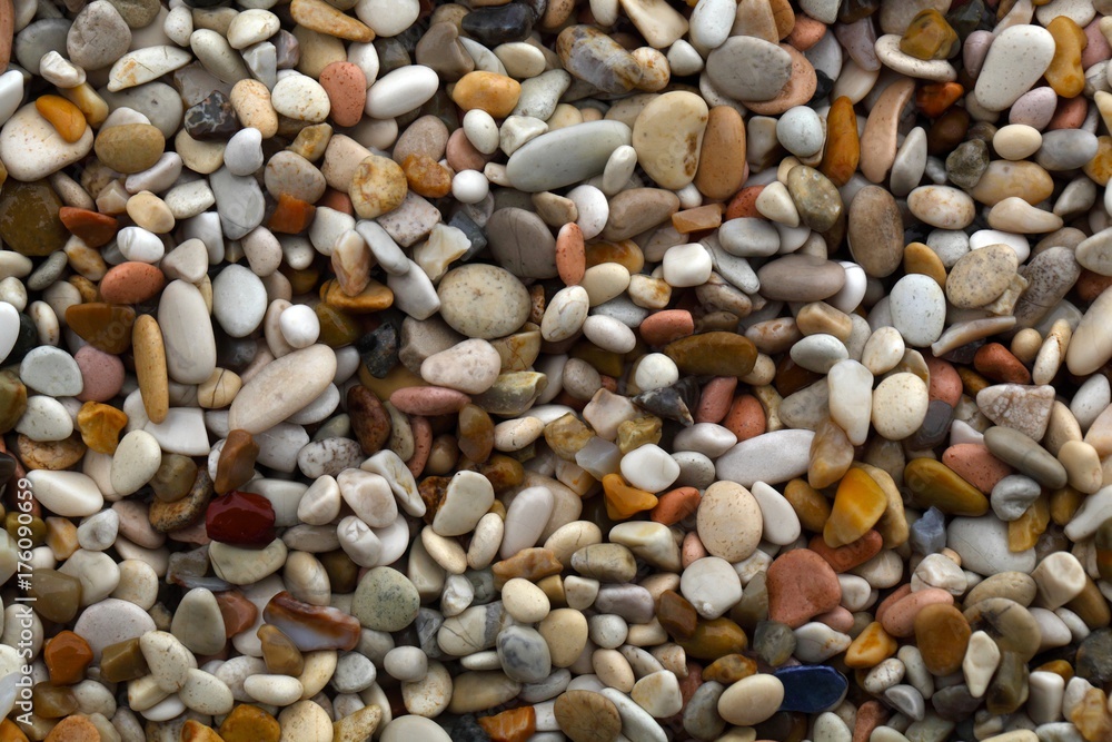 Different colored beach pebbles Different colored beach pebbles