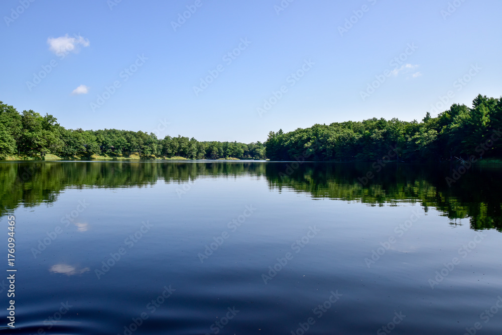 blue sky reflection in water lake
