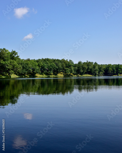 blue sky reflection in water lake