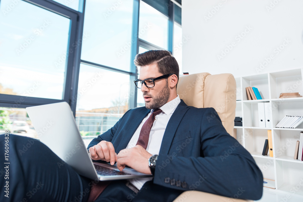businessman using laptop in office businessman using laptop in office