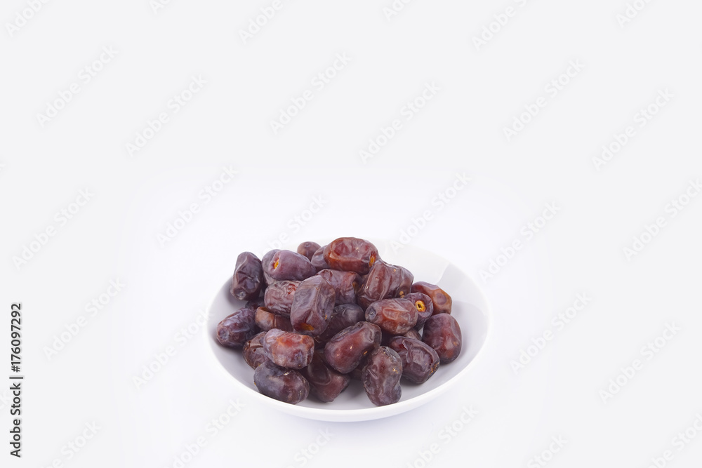 Close up concept of dried Dates and Dates concentrate on isolated white background. Close up concept of dried Dates and Dates concentrate on isolated white background.