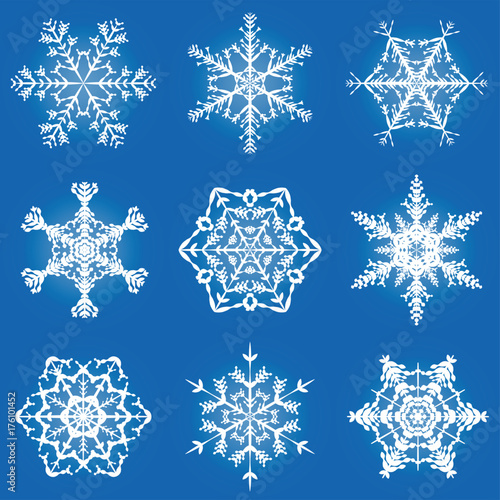 Snowflakes ornate pattern - nine filigree, graceful, delicate vector illustration snowflakes on square format blue gradient background.