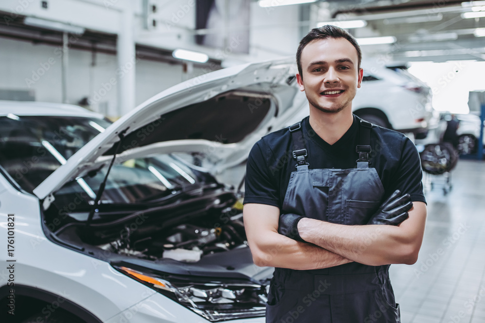 Handsome auto service mechanic Handsome auto service mechanic