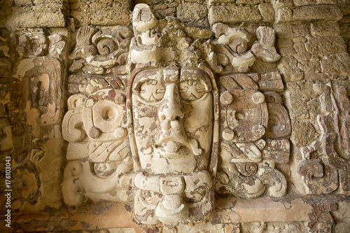 well preserved statue on the Temple of the Measks at Kohunlich maya archaeological site in Quintana Roo Mexico photo