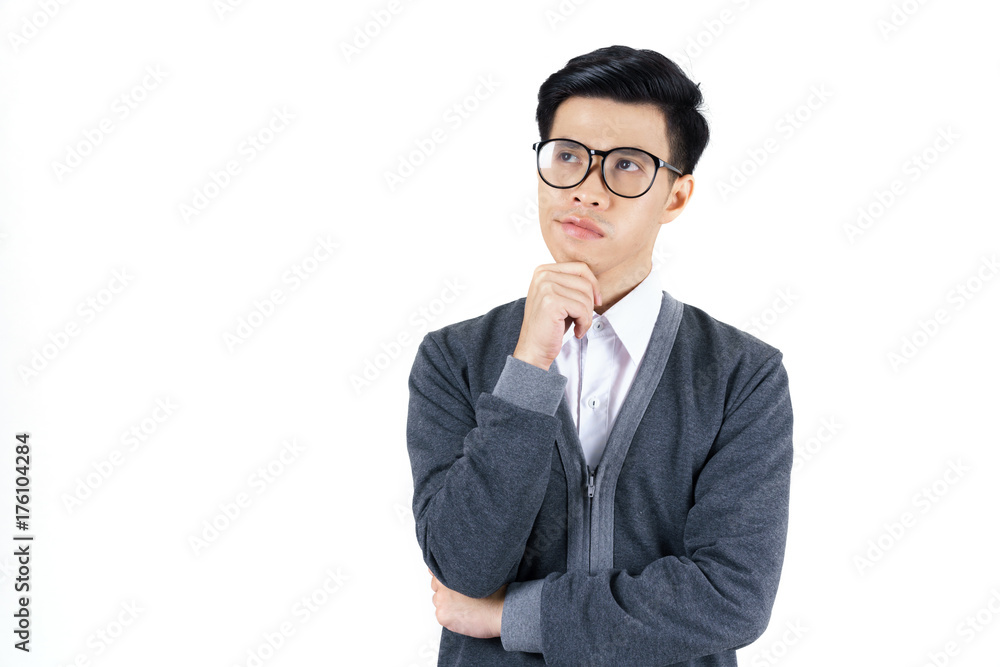 Young Asian man in white shirt and grey jacket thinking isolated on white background Young Asian man in white shirt and grey jacket thinking isolated on white background