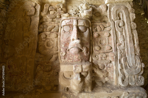 well preserved statue on the Temple of the Measks at Kohunlich maya archaeological site in Quintana Roo Mexico photo