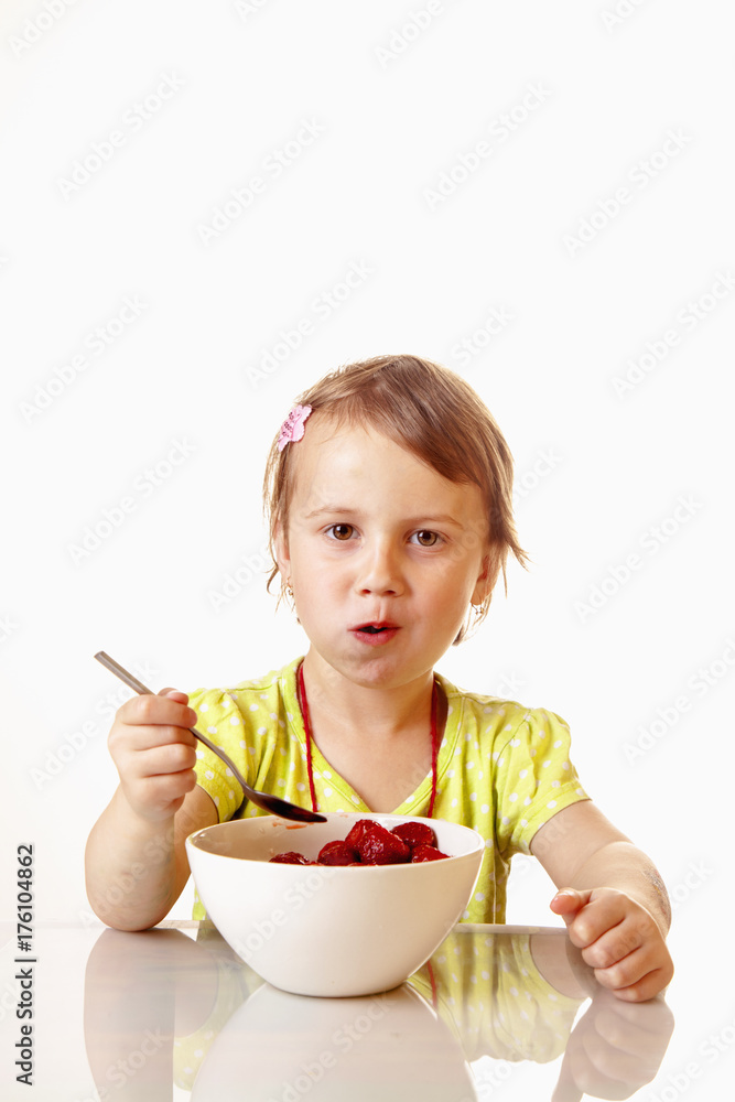 A little beautiful baby girl eating and enjoying of fresh strawberries. (Health, Nutrition, Vitamins, Happy Childhood Concept) A little beautiful baby girl eating and enjoying of fresh strawberries. (Health, Nutrition, Vitamins, Happy Childhood Concept)