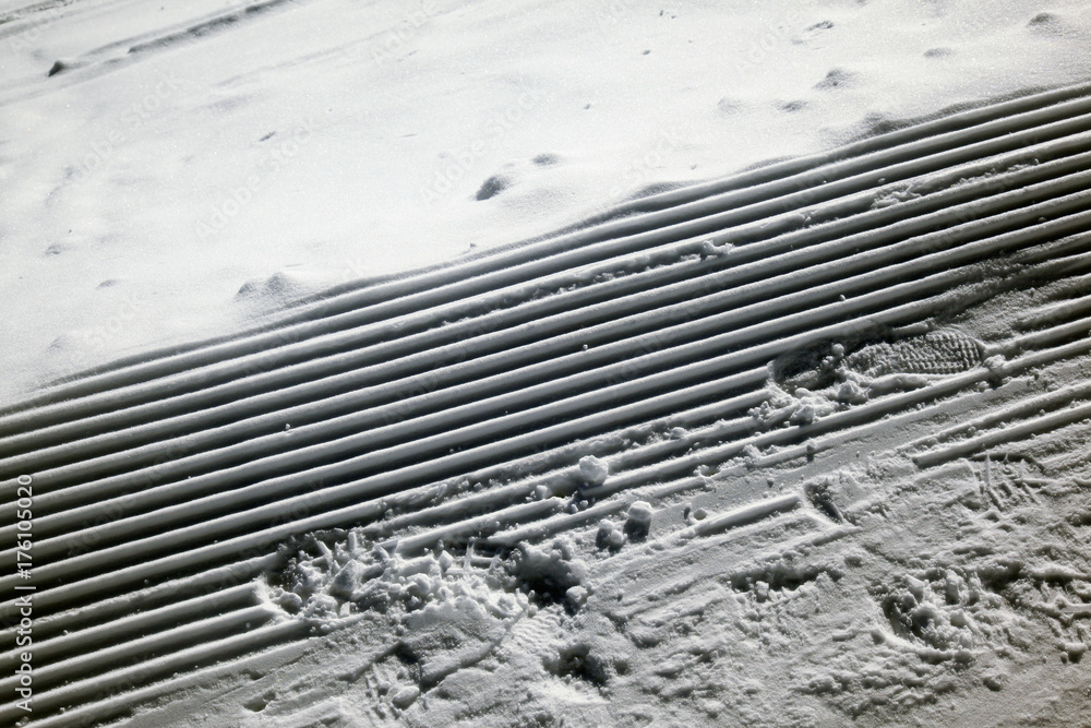 Fototapeta premium Marks on the snow covered landscape
