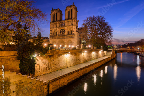 Notre Dame de Paris cathedral at dawn with the Seine River. Daybreak in the 4th Arrondissement, Ile de La Cite, Paris, France