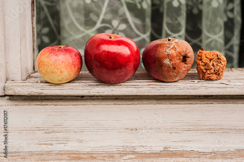 four apples: an acerbic, a mature, an old, a march