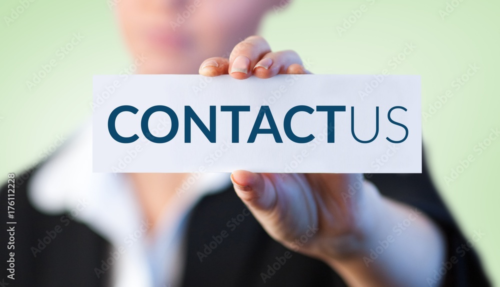 Composite image of close up of businesswoman holding blank card Composite image of close up of businesswoman holding blank card