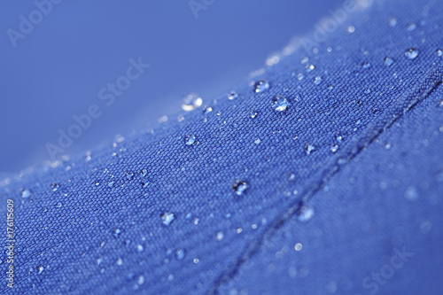 Wind and weatherproof fabric of a softshell mountaineering jacket. photo