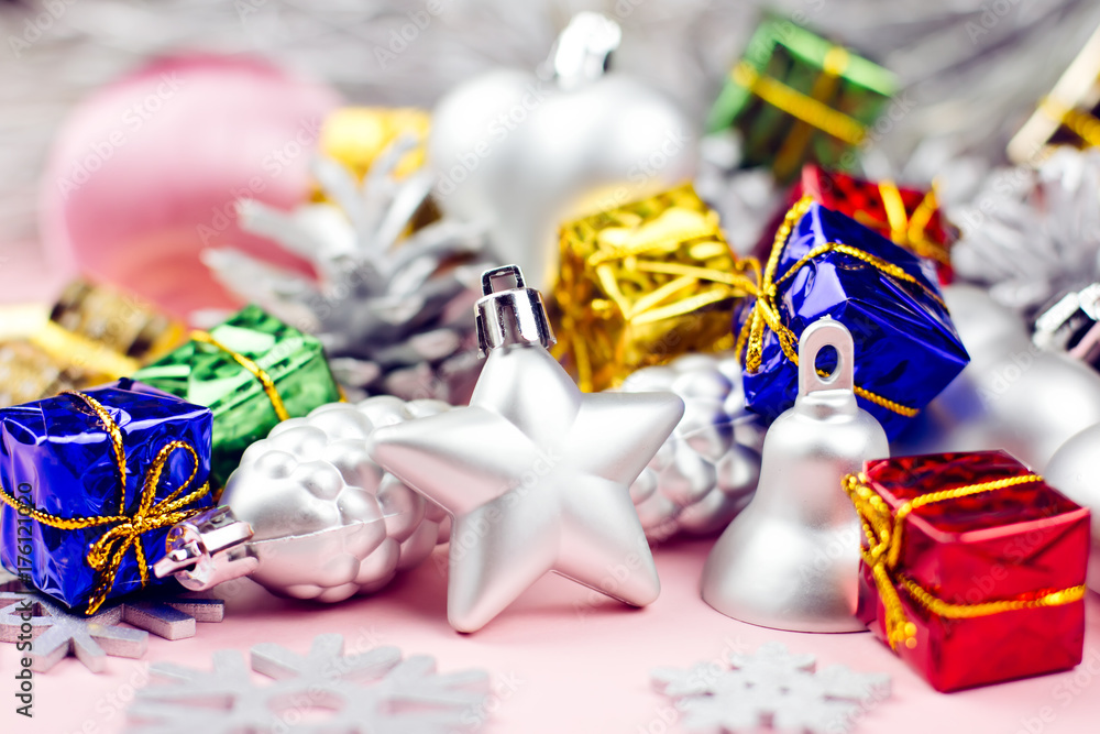 Colorful Christmas ornaments close up on a pastel background