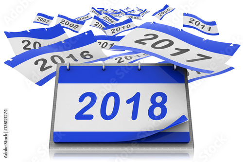 Fogli di calendario ad anelli da scrivania si allontanano verso l'infinito scoprendo l'anno 2018 photo