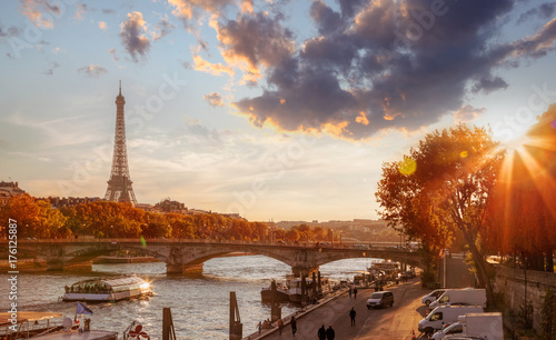 Photography Paris with Eiffel Tower against colorful sunset in France